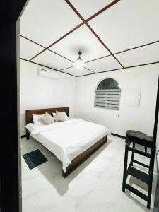 En eller flere senge i et værelse på Seliya Villa Retreat