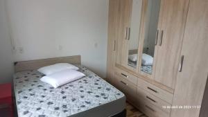 Giường trong phòng chung tại Casa França