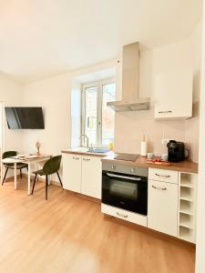 Kuchyň nebo kuchyňský kout v ubytování Le Herriot 3 Hyper Centre 5min de la Gare à pied