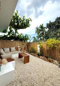 a living room with a couch and a coffee table at Gym house in San Vicente