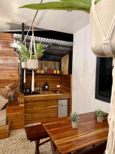 a kitchen with wooden counters and a sink in a room at Gym house in San Vicente
