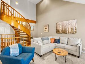 a living room with a couch and a table at Alpine Base Camp Hot Tub 1Gbps pool table foosball in Cottonwood Heights