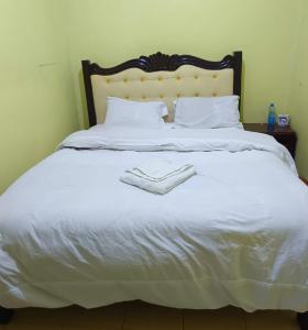 Ένα ή περισσότερα κρεβάτια σε δωμάτιο στο Landmarino hotel