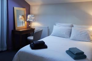 Postel nebo postele na pokoji v ubytování la chaume st martin