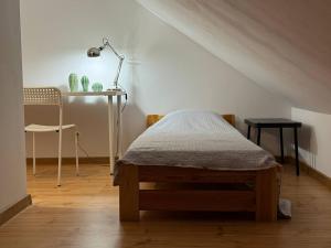 En eller flere senge i et værelse på Szczecin Mierzyn Windmill