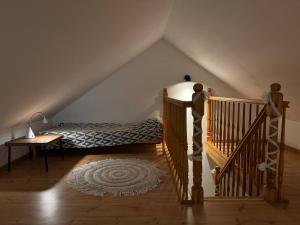 En eller flere senge i et værelse på Szczecin Mierzyn Windmill