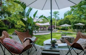 Zahrada ubytování Yangshuo Courtyard Hotel - An all-English team by the Li River