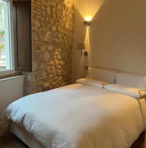 En eller flere senge i et værelse på Lodge of rocks