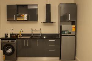 Køkken eller tekøkken på The Reach Apartments + 9 billeder