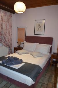 Postel nebo postele na pokoji v ubytování Soula's Cozy House