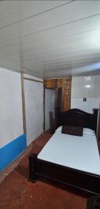 Giường trong phòng chung tại Anita's Apartment