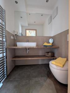 Koupelna v ubytování Apartments Fischerklause am Bodensee + 5 fotografií