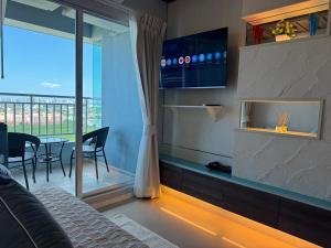 Et opholdsområde på Lumpini Park Beach Jomtien Pattaya Condo 21F