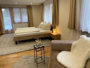 En eller flere senge i et værelse på Hof Kurzamann