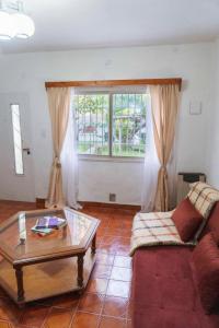 Et opholdsområde på Casa cerca del centro luminosa y tranquila con patio