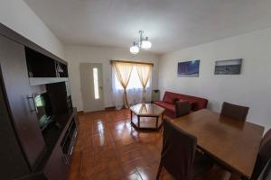 Et tv og/eller underholdning på Casa cerca del centro luminosa y tranquila con patio + 24 billeder