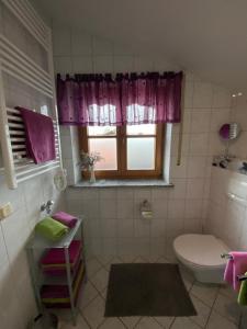 Ένα μπάνιο στο Ferienwohnung Elisabeth