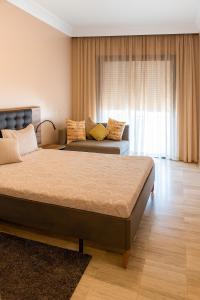 Ένα ή περισσότερα κρεβάτια σε δωμάτιο στο Beach apartment with pool Skhirat beach +18 φωτογραφίες