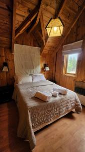 Giường trong phòng chung tại AWEN