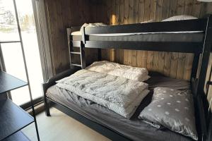 Postel nebo postele na pokoji v ubytování Gemütliche Hütte in traumhafter Natur auf 1000 m