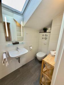 Et badeværelse på Gästehaus Florian + 14 billeder