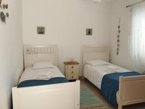 En eller flere senge i et værelse på Casa A