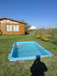 Swimmingpoolen hos eller tæt på Cabaña La Carola + 12 billeder