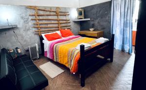 En eller flere senge i et værelse på Bilocale vista Etna con parcheggio