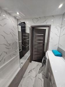 Koupelna v ubytování Apartament Daisy 2