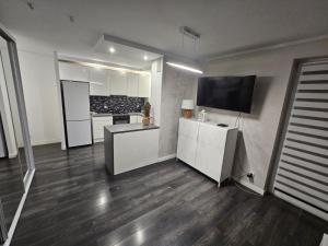 Kuchyň nebo kuchyňský kout v ubytování Apartament Daisy 2