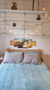 En eller flere senge i et værelse på Departamento Cadaqués