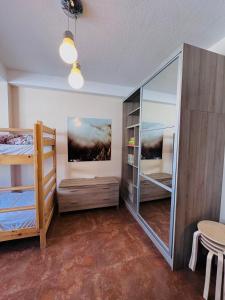 Кровать или кровати в номере 2-room Apartment NFT Gudauri Penta 404