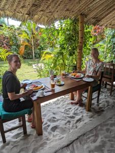 Gæster der bor på Kua Garden Bungalow