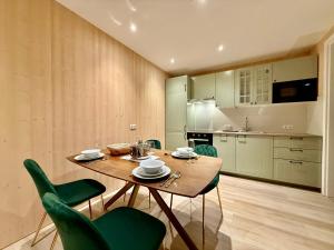 Η κουζίνα ή μικρή κουζίνα στο Treehouse - Alpinlake Apartments