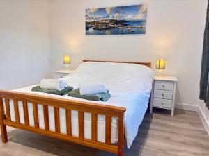 En eller flere senge i et værelse på Bright Cozy 2 bedroom Apartment in Oxford