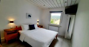 Giường trong phòng chung tại Blue Lagoon Holiday Apartments & Double Room with Balcony +106 ảnh