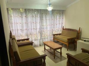 Posezení v ubytování Saint Fernand Apartment + 1 fotografie