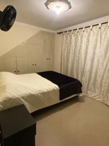 Postel nebo postele na pokoji v ubytování Saint Fernand Apartment