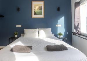 Postel nebo postele na pokoji v ubytování Apparthotel - Saint Gilles 32