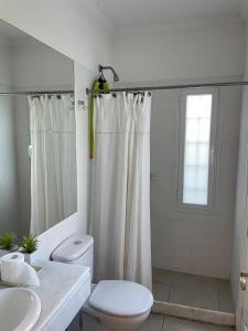 Koupelna v ubytování Casa Del Lago