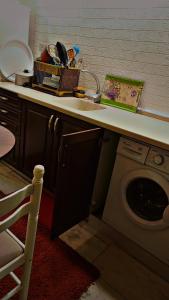 Kuchyň nebo kuchyňský kout v ubytování ضاحيه الأمير راشد + 9 fotografií