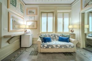 Et opholdsområde på Museo Privato Appartamento in assoluto centro