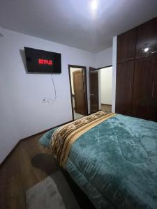 En eller flere senge i et værelse på Departamento Respiro de Altura + 16 billeder