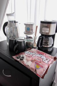 Příslušenství pro přípravu čaje a kávy v ubytování Aldea Hualtepec Glamping