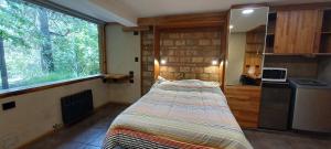 Køkken eller tekøkken på Cabañas km7 Bariloche