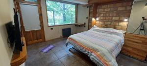 Et tv og/eller underholdning på Cabañas km7 Bariloche