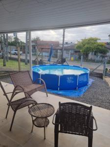 Swimmingpoolen hos eller tæt på Casa Temporada Torres