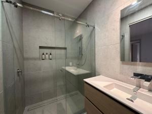 a bathroom with a shower and a sink at Seas the Day - Bay Stay in Tootgarook +12 photos