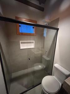 Et badeværelse på Villa Bonita Residencial