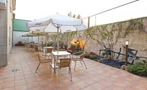 Patio nebo venkovní prostory v ubytování Hotel O Desvio